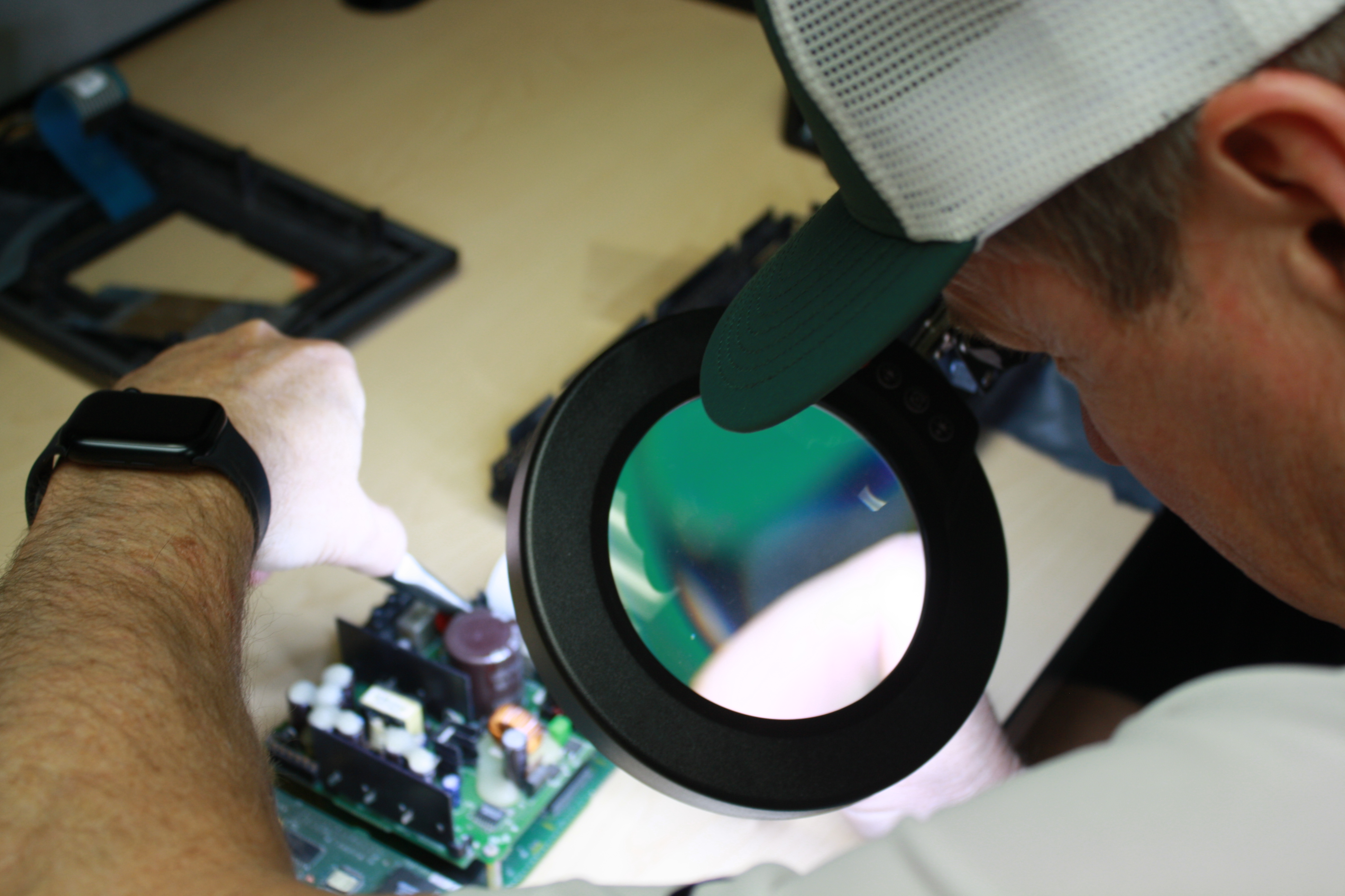 Replace Industrial technician repairing an industrial automation unit